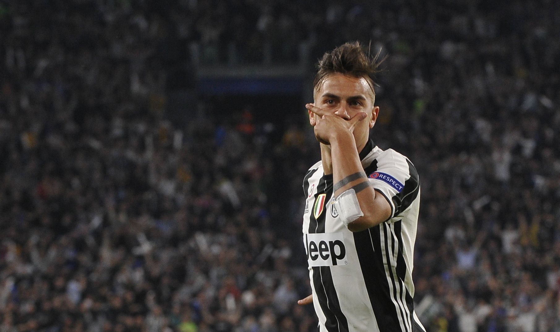 Juventus' Paulo Dybala celebrates scoring their first goal - 17-CCT51731