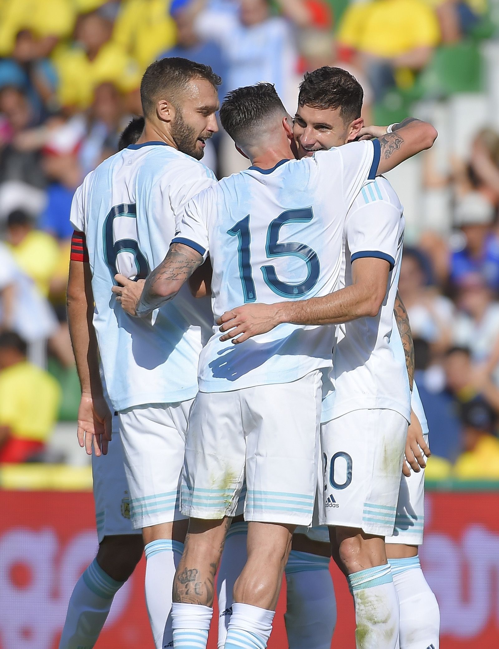Argentina's  midfielder Lucas Alario (R) celebrates  with teammates after scoring during the International Friendly football match against Ecuador at the Martinez Valero stadium in Elche, on October 13, 2019. (Photo by JOSE JORDAN / AFP)