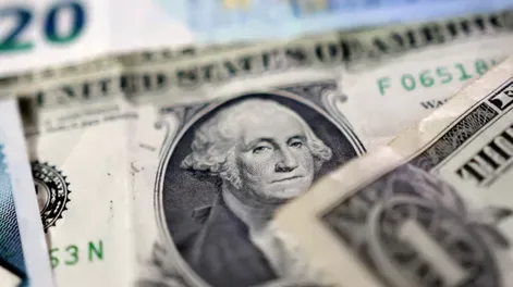 Dólar.-