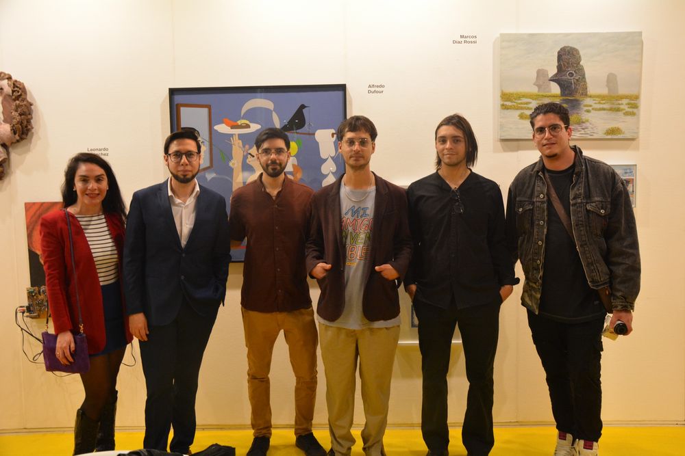El director del Museo Franklin Rawson (segundo de izq. a der.) en el stand de San Juan, en la pasada edición de ArteBa