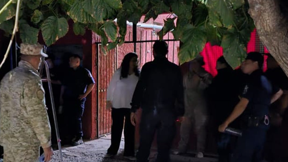 La casa de los Luján cuando era allanada.