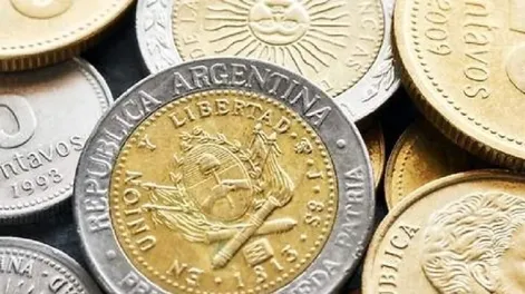 Venden monedas de 1 peso hasta $15.000 cada una