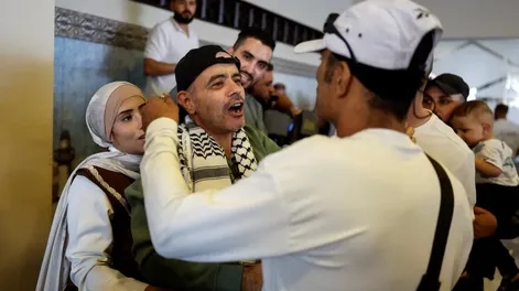 Presos palestinos liberados. Foto: REUTERS/Ammar Awad