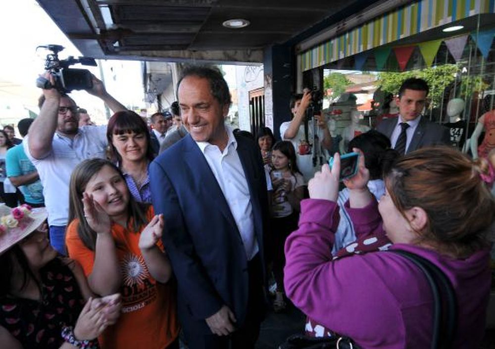 Un llamado de Scioli para tentar a Massa