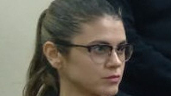 LUCIANA BUSTOS, acusada.