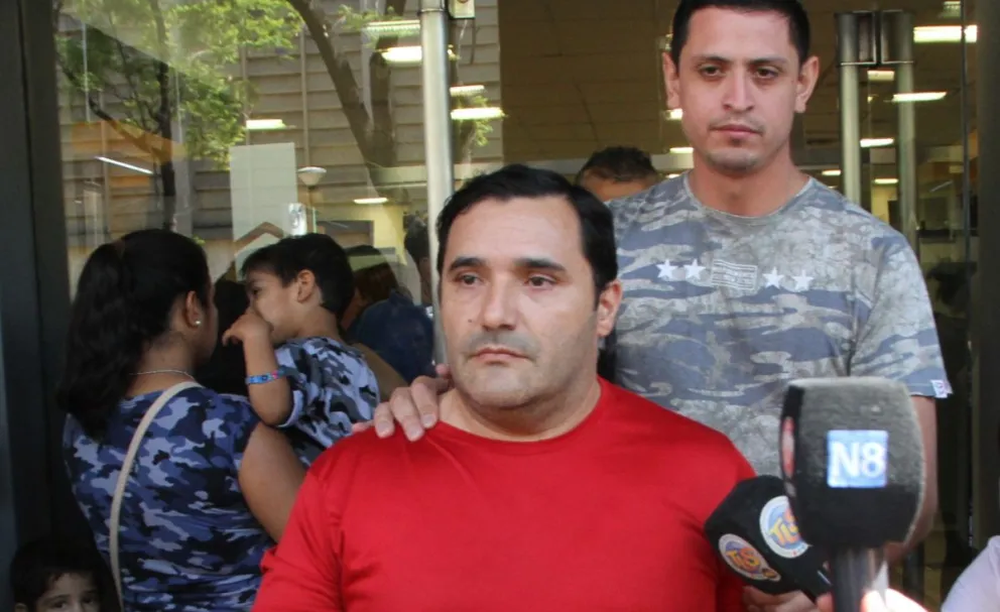 Romeo Isidoro Saavedra cuando fue detenido en el Banco Hipotecario.