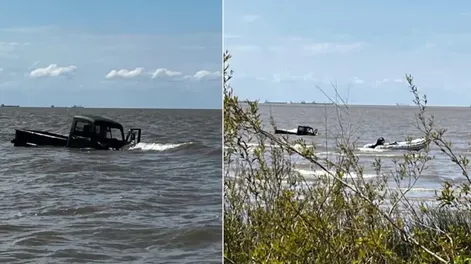 [VIDEO] Se metieron con su camioneta al Río de la Plata, el agua la tapó y volvieron a la costa nadando
