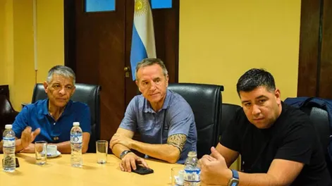 Jorge Sola, Octavio Argüello y Cristian Jerónimo, cotitulares de la CGT.