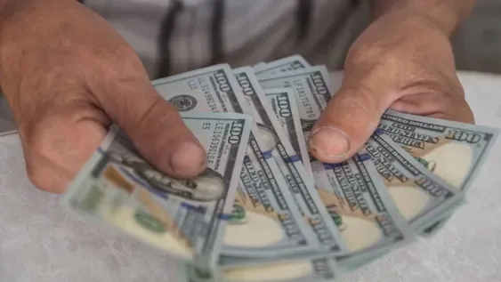 Dólar.-