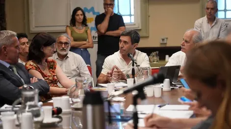 Andino, con Taiana y Basterra a los costados.