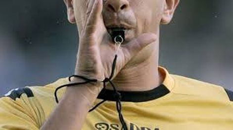 Árbitro de fútbol.-