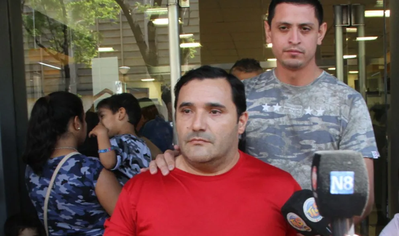 Romeo Isidoro Saavedra cuando fue detenido en el Banco Hipotecario.
