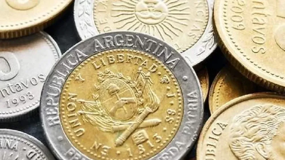Venden monedas de 1 peso hasta $15.000 cada una
