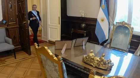 Las dos primeras fotos que eligió Fernández para tener en su despacho