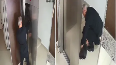 Dramático momento: un perro quedó colgado de un ascensor y un hombre lo reanimó