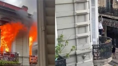 Dramático escape de un incendio en un edificio: una vecina quedó colgando de un cable