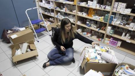 Con miedo y bolsillos  flacos votan en Grecia